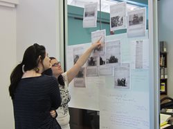 Two students reviewing documents