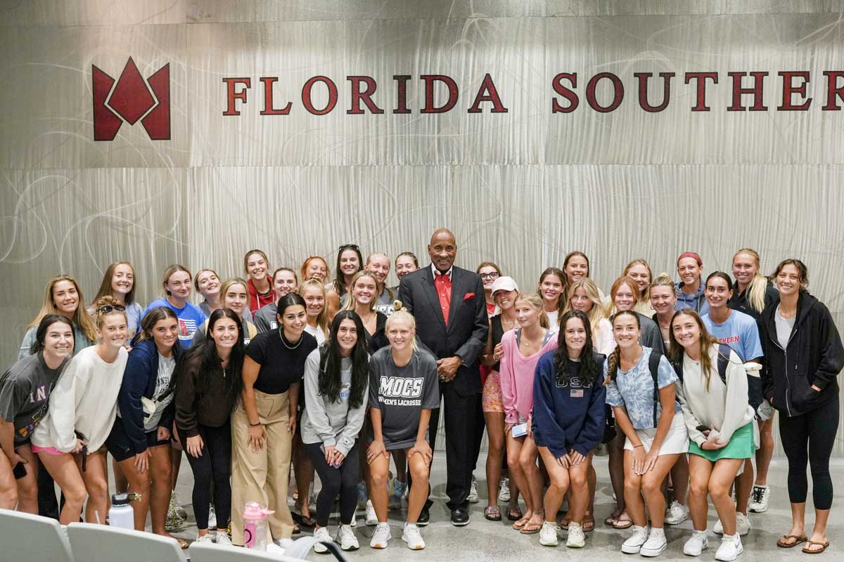 George Tinsley with FSC's Women's Lacrosse Team