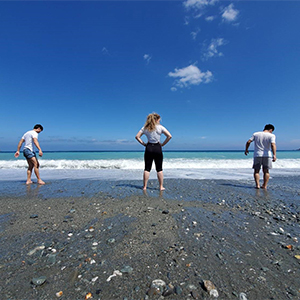 Kylie Torres '18 (center) on a beach in Taiwan.