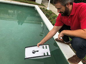 Dr. Gabe Langford launches the Trident ROV for its inaugural voyage.